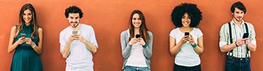 Students watching their mobiles