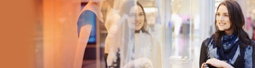 Woman looking at the window shop