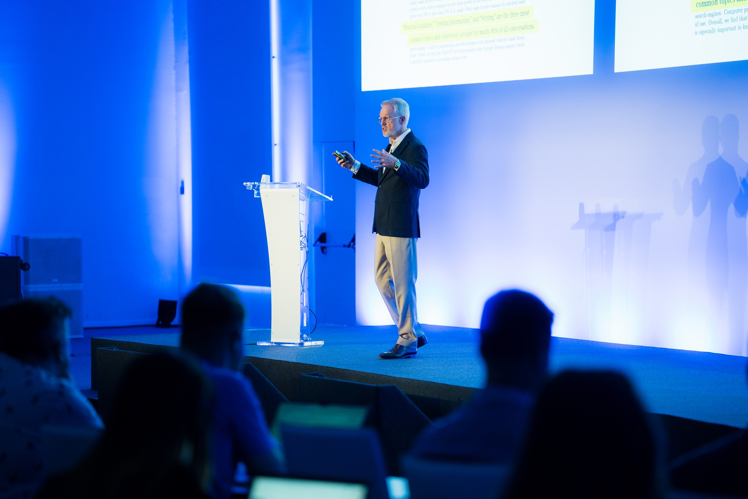 Avature Founder and CEO Dimitri Boylan on stage delivering his opening remarks on the importance of AI being contextual and workflow-embedded.